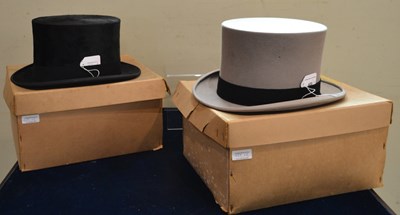 Lot 409 - Two top hats, one in grey, interior label 'R....