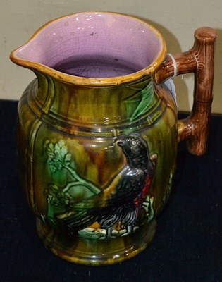 Lot 423 - A late 19th century Majolica style pitcher...