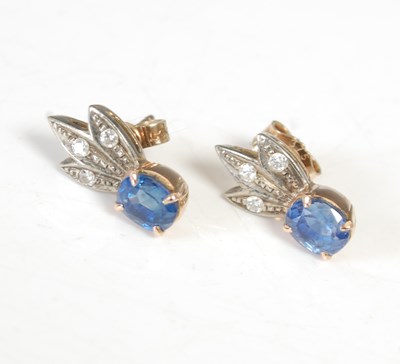 Lot 274 - A pair of white and yellow metal sapphire and...