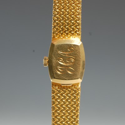 Lot 9 - A vintage ladies Omega 18ct gold bracelet...