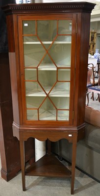 Lot 736 - A 19th century mahogany corner cabinet on...