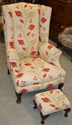 Lot 704 - An early 20th century high back armchair with...