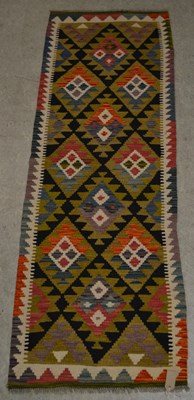 Lot 757 - A Maimana Kilim runner, the ochre and black...