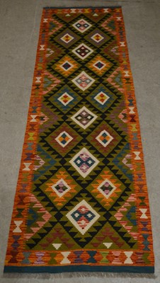 Lot 758 - A Maimana Kilim runner, the ochre and black...