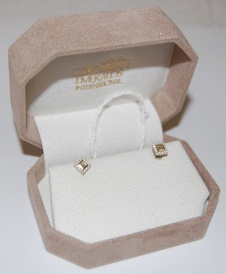 Lot 36 - A pair of 18ct white gold and diamond set Art...