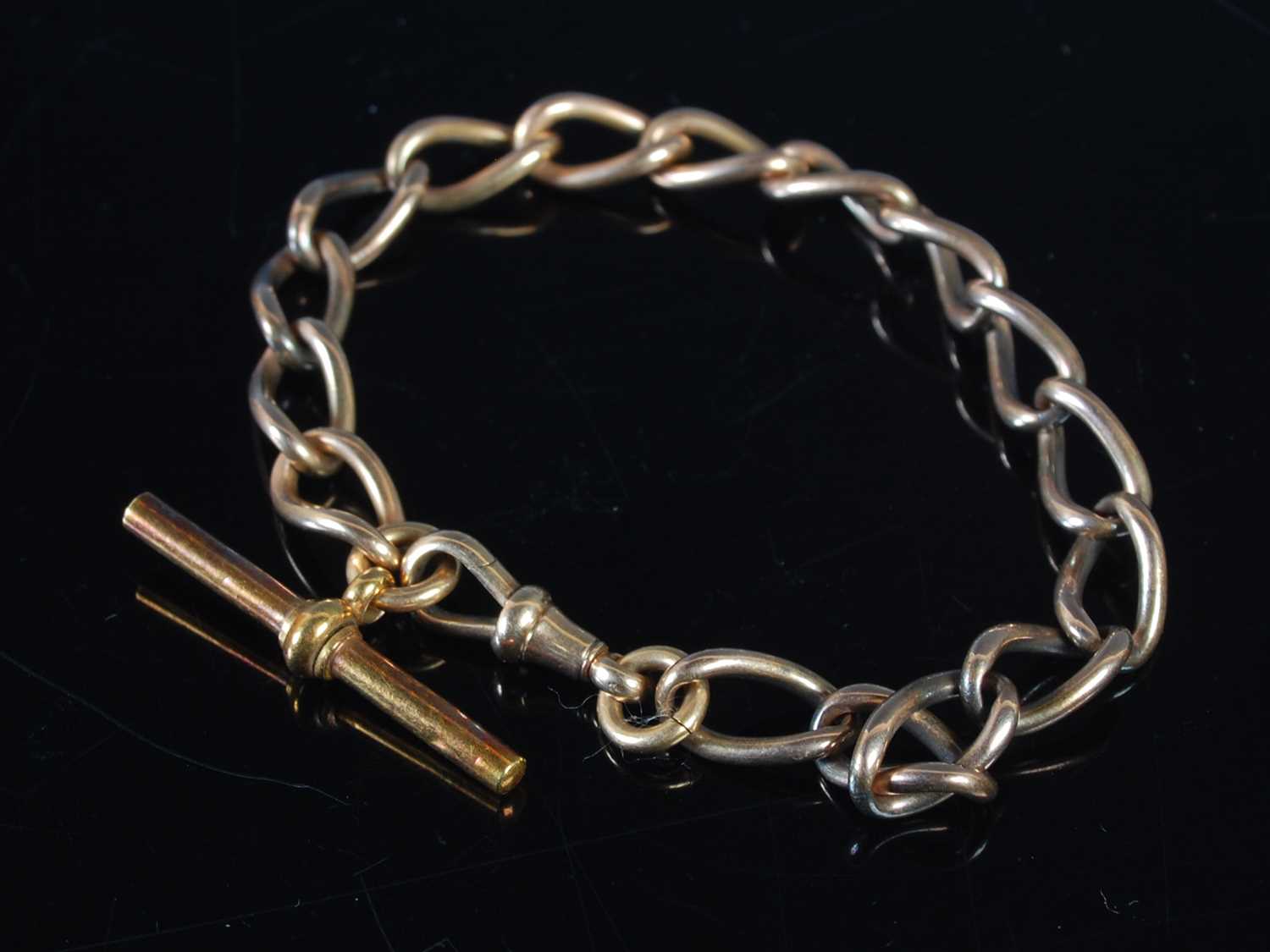 Lot 315 - A smart vintage yellow metal oval link...