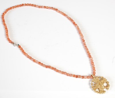 Lot 12 - Malcolm Appleby, an 18ct gold owl pendant,...