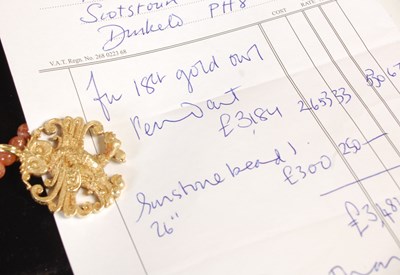 Lot 12 - Malcolm Appleby, an 18ct gold owl pendant,...