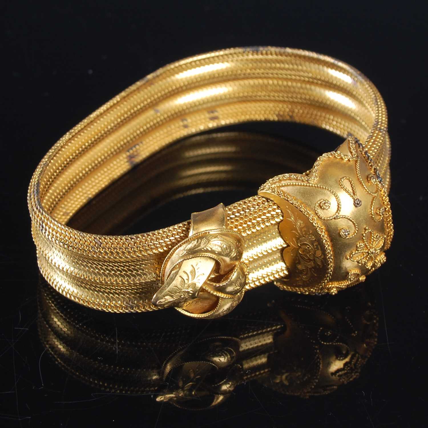 Lot 240 - A late 19th century articulated yellow metal...