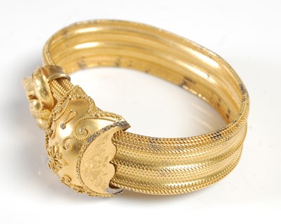 Lot 240 - A late 19th century articulated yellow metal...