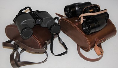 Lot 285 - Two vintage cased sets of binoculars...
