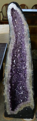 Lot 327D - A large amethyst cathedral geode, with a deep...