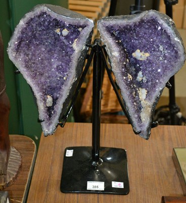 Lot 327 - An amethyst crystal geode cathedral specimen,...
