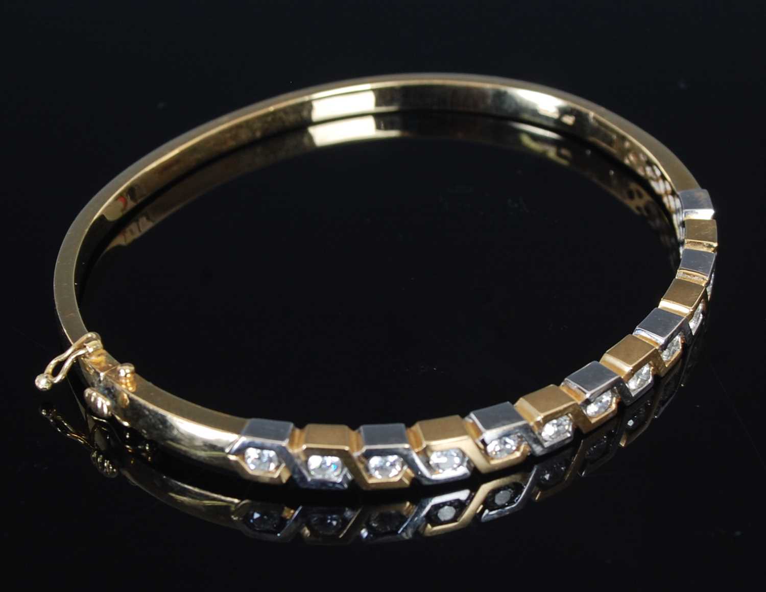 Lot 285 - Retailed by Graham Stewart, an 18ct yellow and...