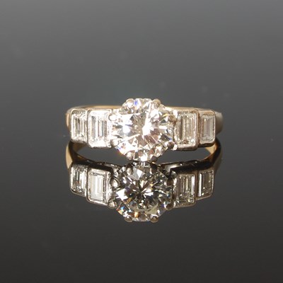 Lot 79 - A yellow and white metal five stone diamond...