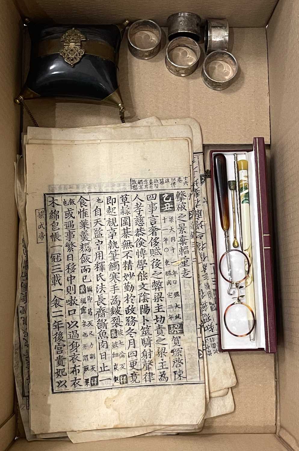 Lot 380 - A box of assorted items, to include nine...