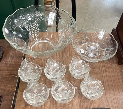 Lot 247 - A 20th century punch bowl set, the bowls with...