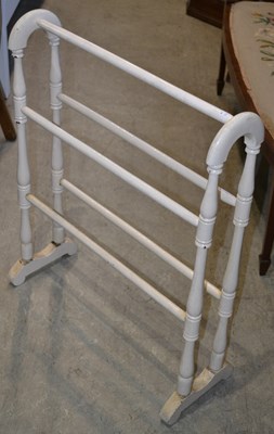 Lot 518 - An early 20th century white painted towel rail,...
