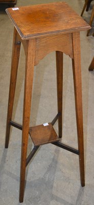 Lot 503 - An Arts & Crafts style oak plant stand, with...