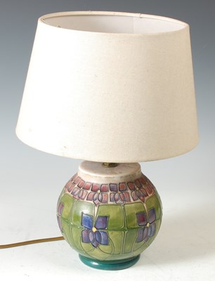 Lot 348 - A Moorcroft Violet pattern table lamp, with...