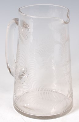 Lot 148 - A 19th century clear glass pitcher, inscribed '...