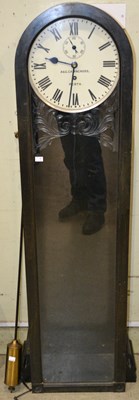 Lot 551 - A 19th century wall clock, with arched top and...