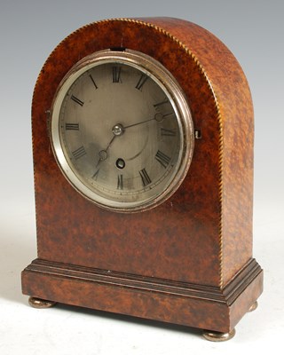 Lot 244 - An early 20th century burr wood mantle clock,...