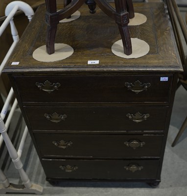 Lot 519 - An early 20th century oak four drawer chest,...