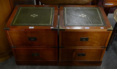 Lot 556 - A pair of vintage campaign style two drawer...