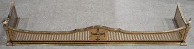 Lot 571 - A 19th century / later brass fire place fender,...
