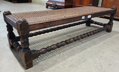 Lot 552A - An early 20th century long oak framed cane...