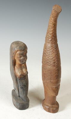 Lot 250 - A 20th century carved wooden bust, wearing...