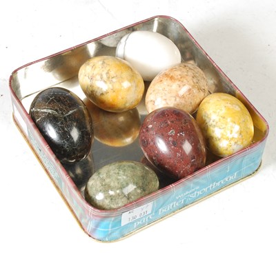 Lot 232 - A group of seven polished stone specimen eggs,...