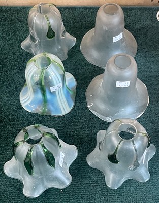 Lot 311 - A group of six early 20th century glass lamp...