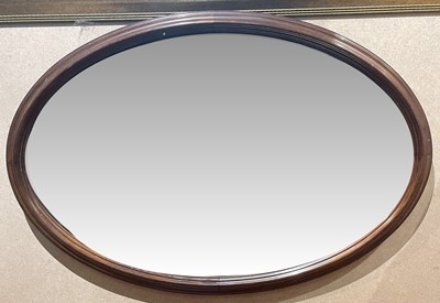 Lot 660 - An early 20th century mahogany oval wall...