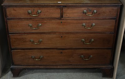 Lot 614 - A Georgian mahogany chest of drawers, with two...