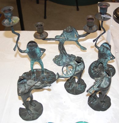 Lot 298 - A group of six bronze whimsical green...