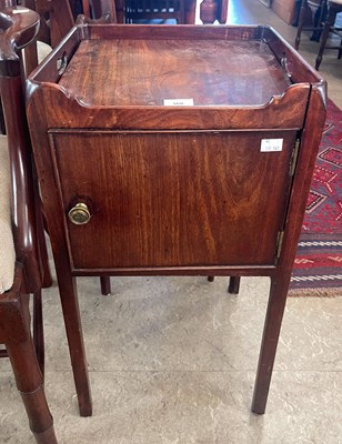 Lot 560 - A 19th century mahogany pot cupboard, with...