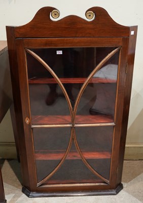 Lot 636 - A 19th century mahogany corner cabinet, the...