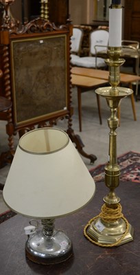 Lot 342 - A 20th century brass candlestick style table...