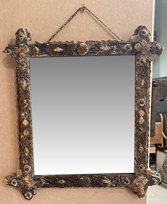 Lot 657 - A small rectangular cork wood wall mirror,...