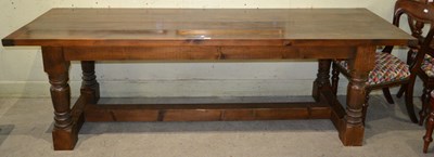 Lot 598 - A farmhouse oak four slat refectory table,...