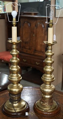 Lot 607 - A pair of 20th century turned brass table...