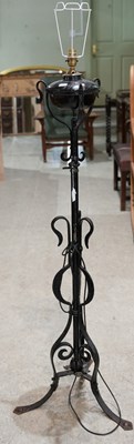 Lot 625 - A 20th century black metal floor standing oil...