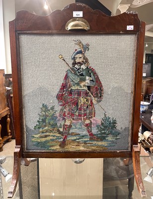 Lot 524 - A 19th century / later fire screen with...