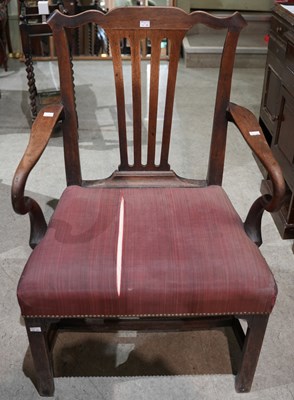 Lot 634 - A George III elbow armchair, with fan shaped...