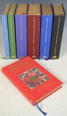 Lot 355 - Rowling (J.K.) complete set of Harry Potter...