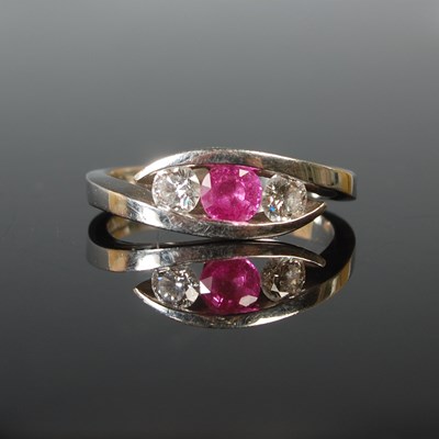 Lot 60 - A platinum pink tourmaline and diamond three...
