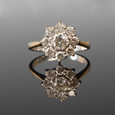 Lot 54 - An 18ct white gold and diamond cluster ring...