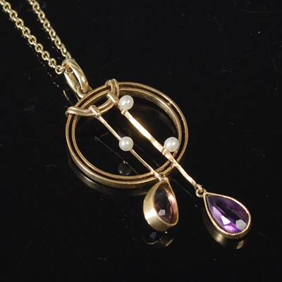 Lot 9 - A 15ct gold necklace, suspending a 15ct gold...